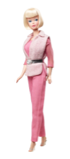 A picture of a Barbie with a blonde bob cut and a pink suit, facing left.